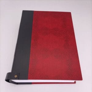 Art et Reliure de Lautrec notaires livre rouge et noir accroche